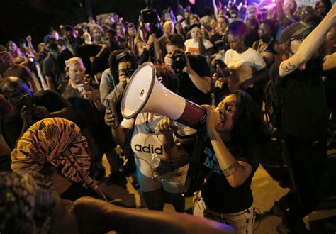 St. Louis police protesters begin picking up checks in $4.9 million settlement